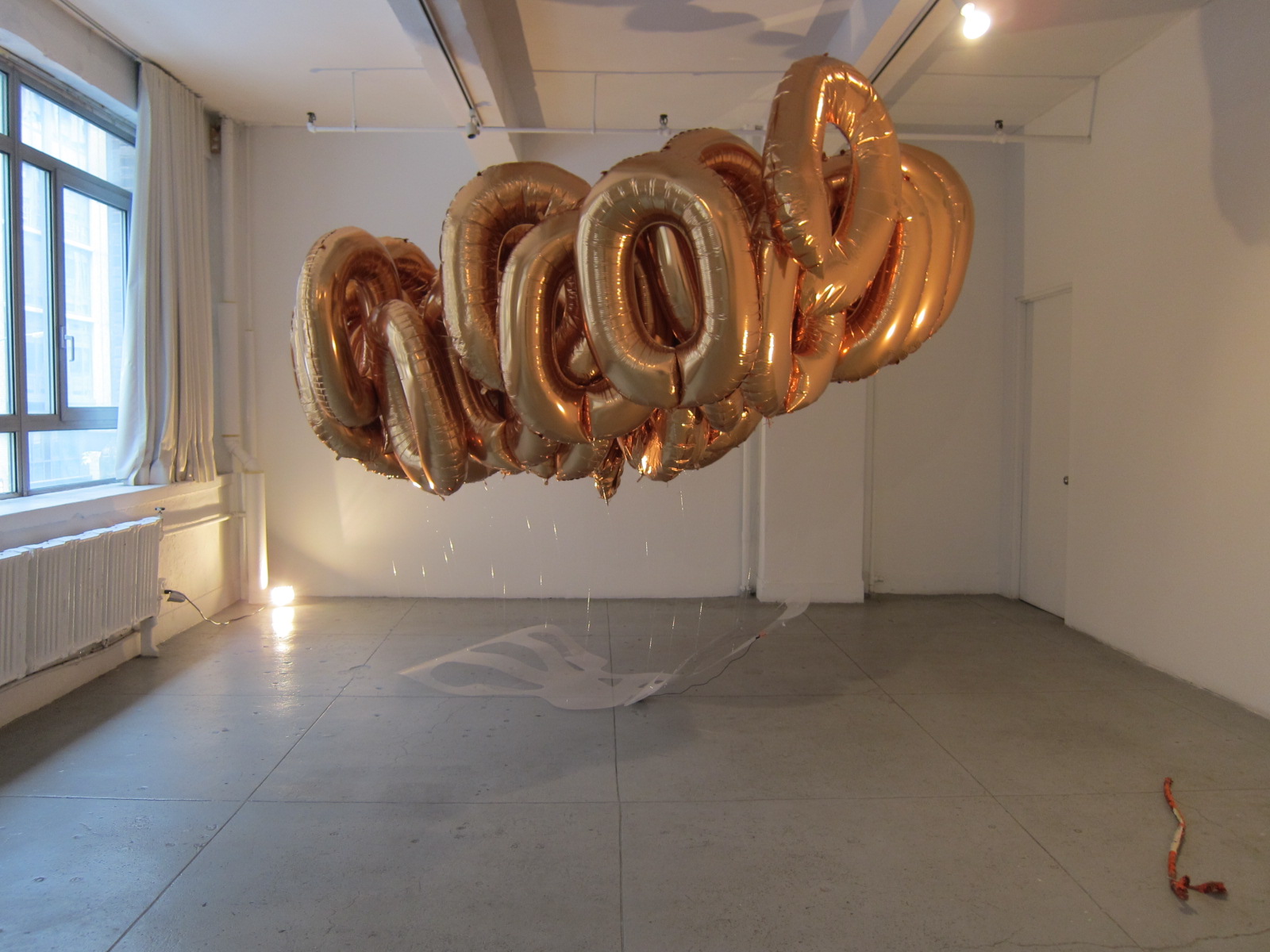   Mitch McEwen,   Levitating State Secrets , 2014. Polycarbonate balloons, helium, electronics. 