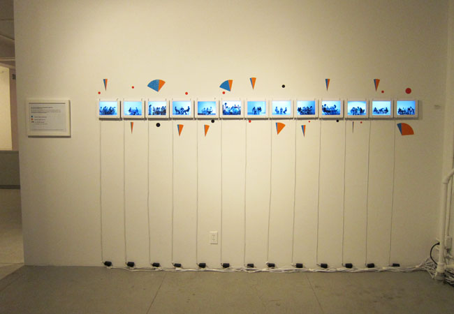   Elisabeth Smolarz,   The One Hundred Dollar Project , 2012. Video installation with vinyl decals. 