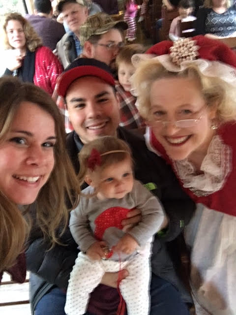 Don't mind our blurry selfie. We were super rushed so Mrs. Clause could move on to the next family!