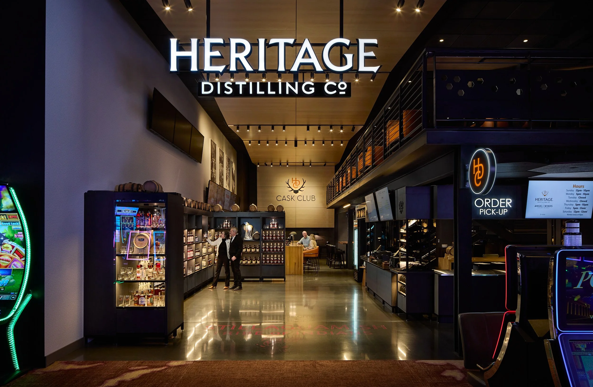 Interior architectural photography of Heritage Distilling tasting room and bar at Angel of the Winds Casino Resort in Arlington, Washington, designed by fi architecture.