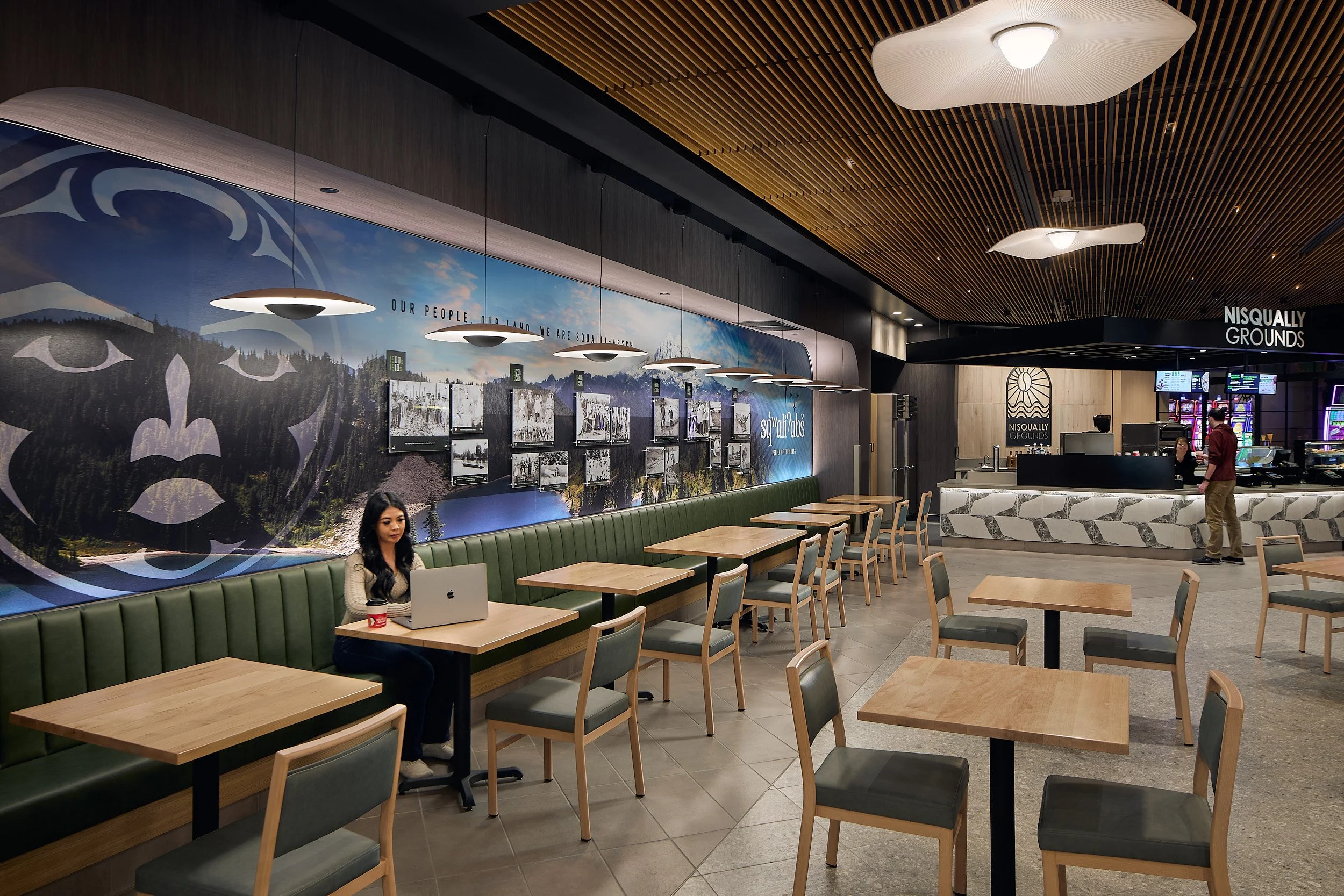 Interior architectural photography showcasing the dining and common seating area of The Delta Food Hall at Nisqually Red Wind Casino in Olympia, Washington, designed by Rice Fergus Miller.