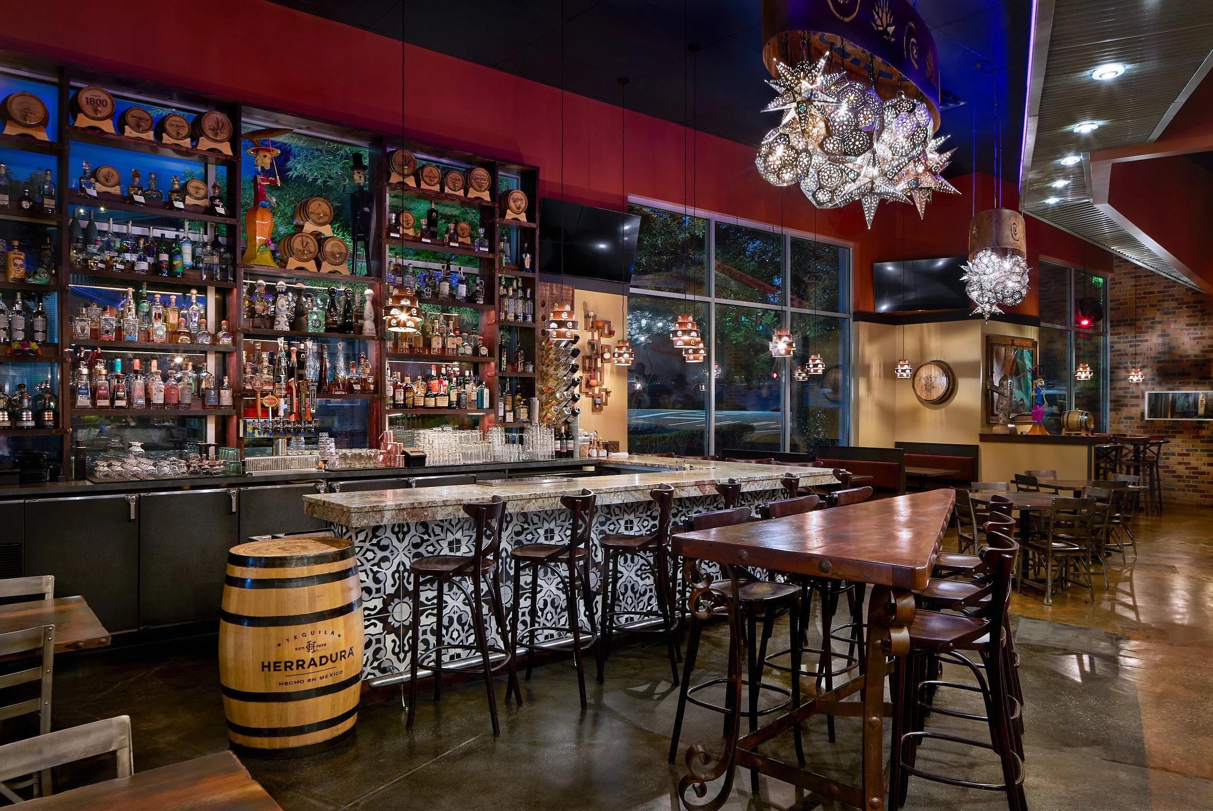 Architectural interior photography showcasing the fully stocked, high-end tequila bar design and display features inside Cava Azul in Woodinville, Washington, designed by Sue Genty Interior Design.