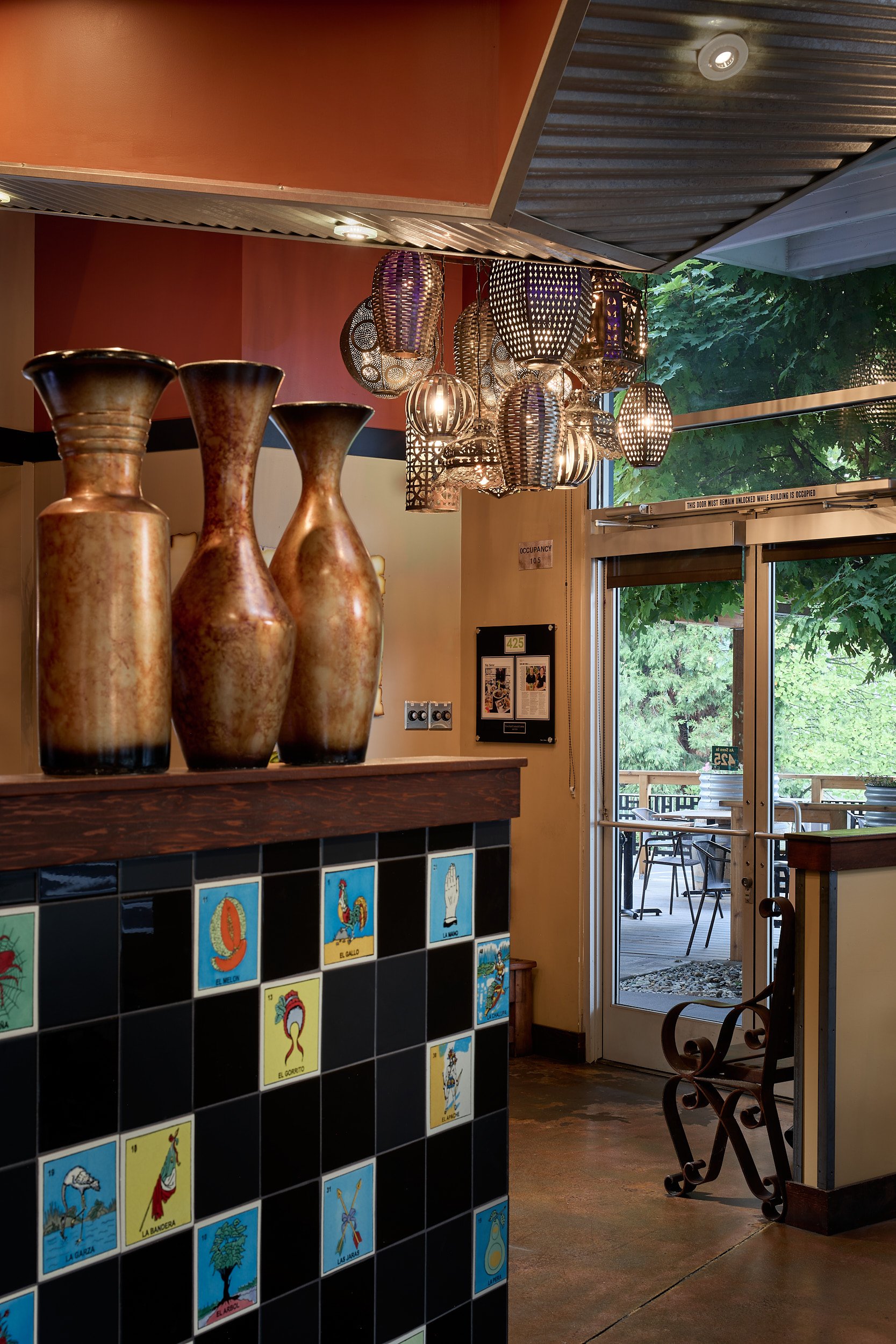 Vertical architectural detail image of the beautiful entry design at Cava Azul Mexican restaurant in Woodinville, Washington, designed by Sue Genty Interior Design.