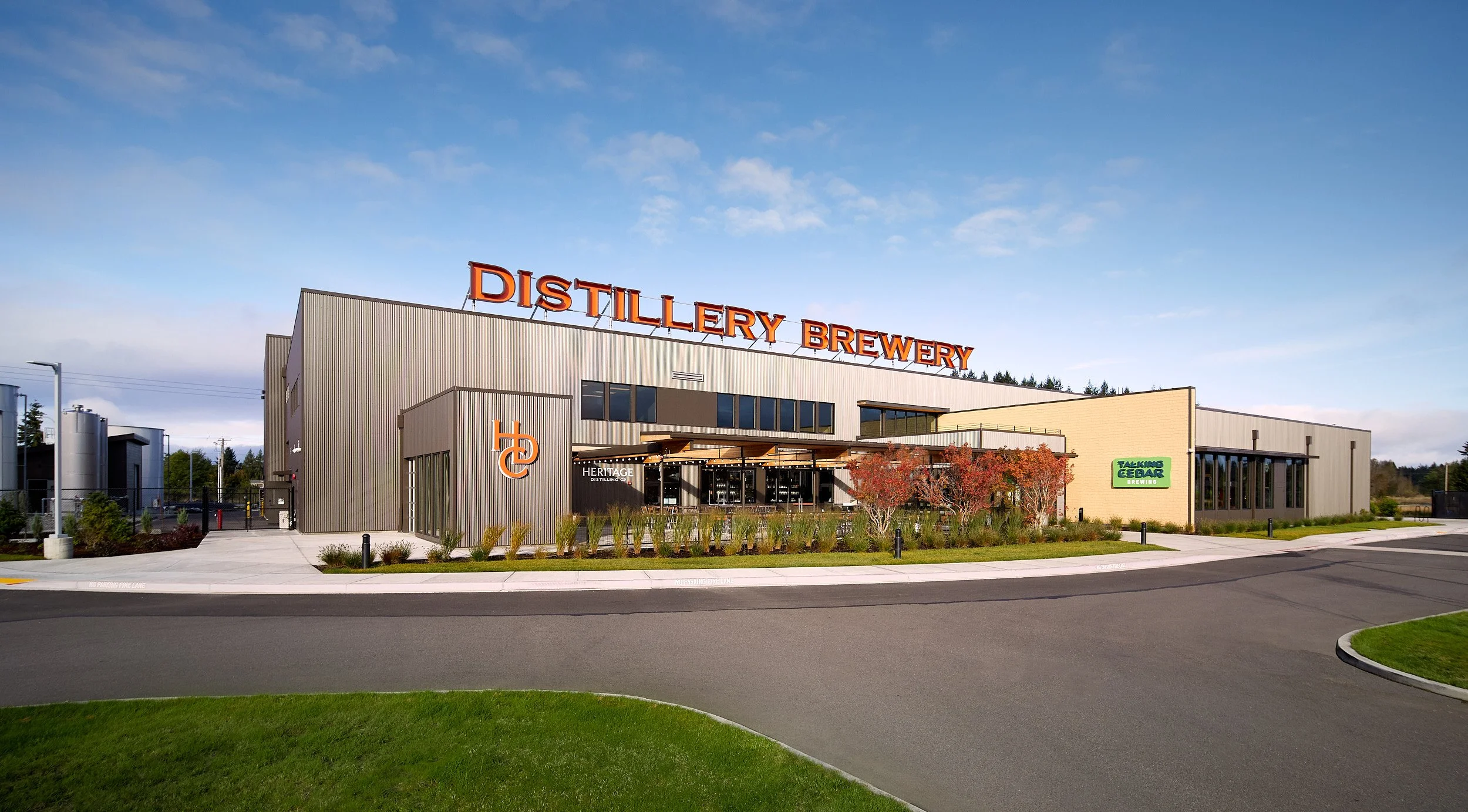 Full exterior architectural elevation of the Talking Cedar Brewery and Distillery facility in Grand Mound, Washington, designed by fi architecture.