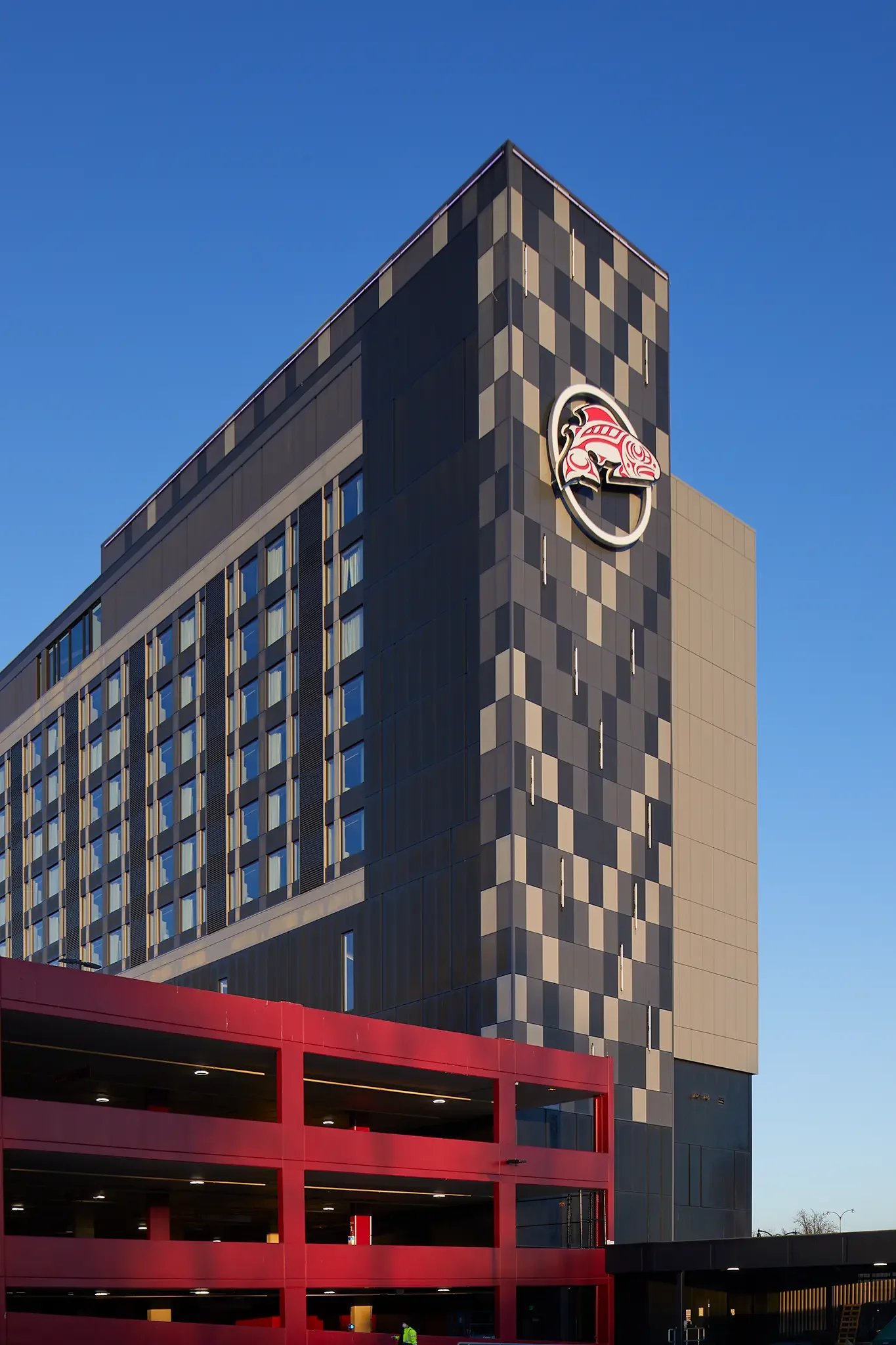 Architectural photograph of the exterior elevation of the Emerald Queen Casino Hotel in Tacoma, Washington, designed by Cuningham Architects.