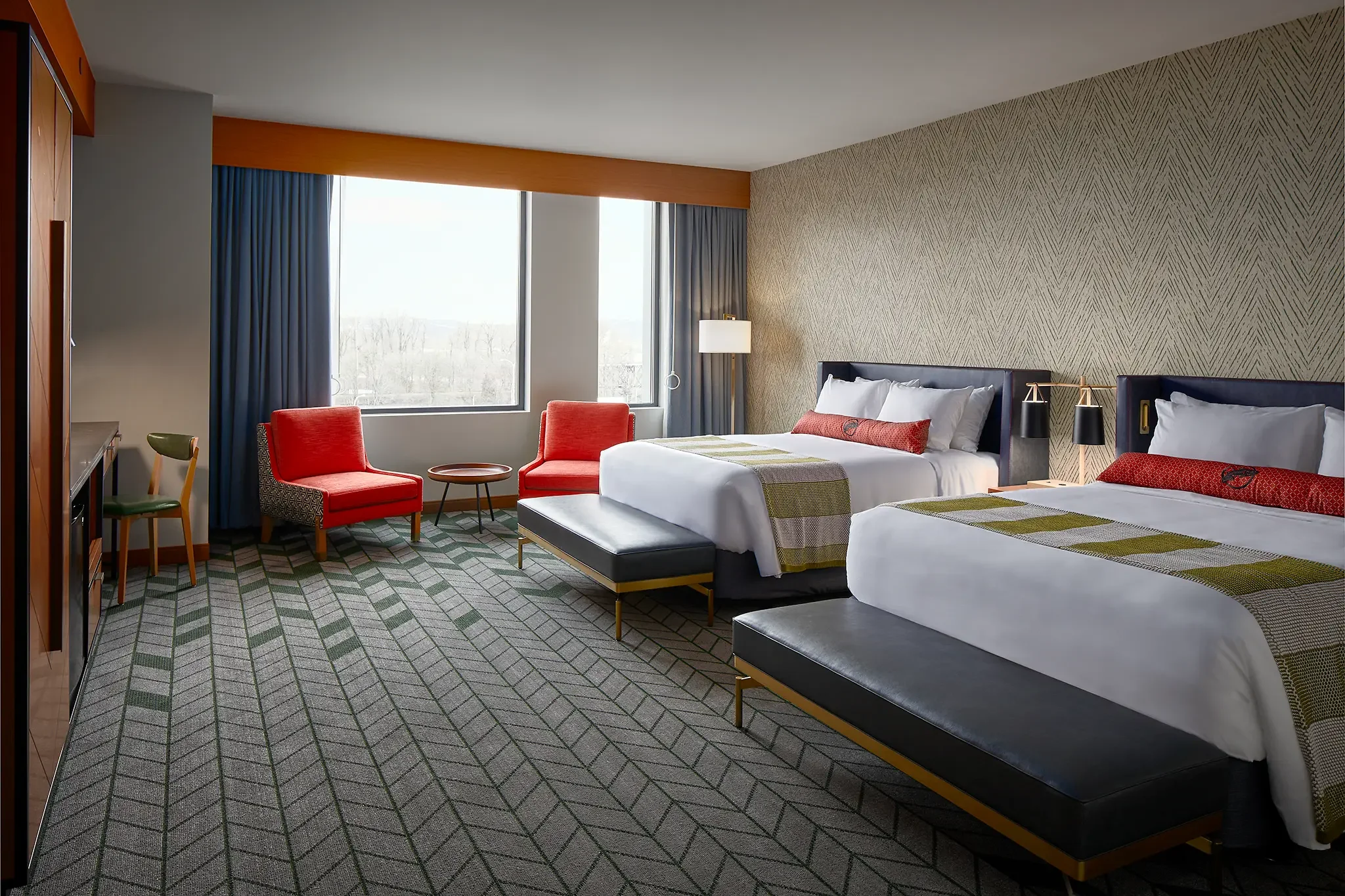 2-Queen Suite guest room interior design and custom FF&E by Cuningham Architects at the Emerald Queen Casino Hotel in Tacoma, Washington.