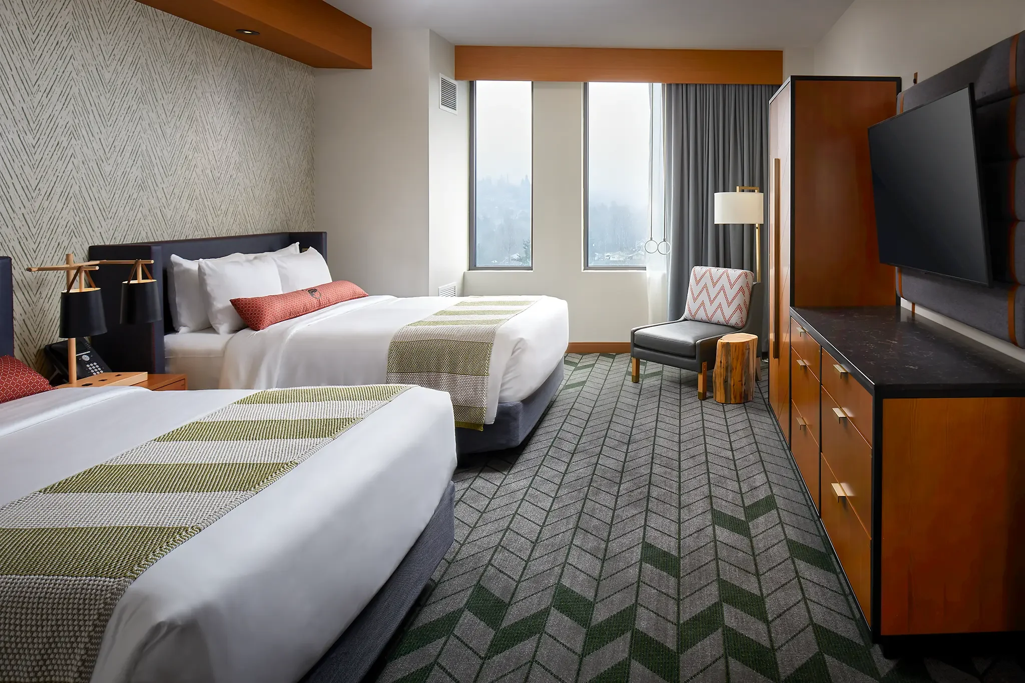 2-Queen guest room interior design and custom FF&E by Cuningham Architects at the Emerald Queen Casino Hotel in Tacoma, Washington.ˀ