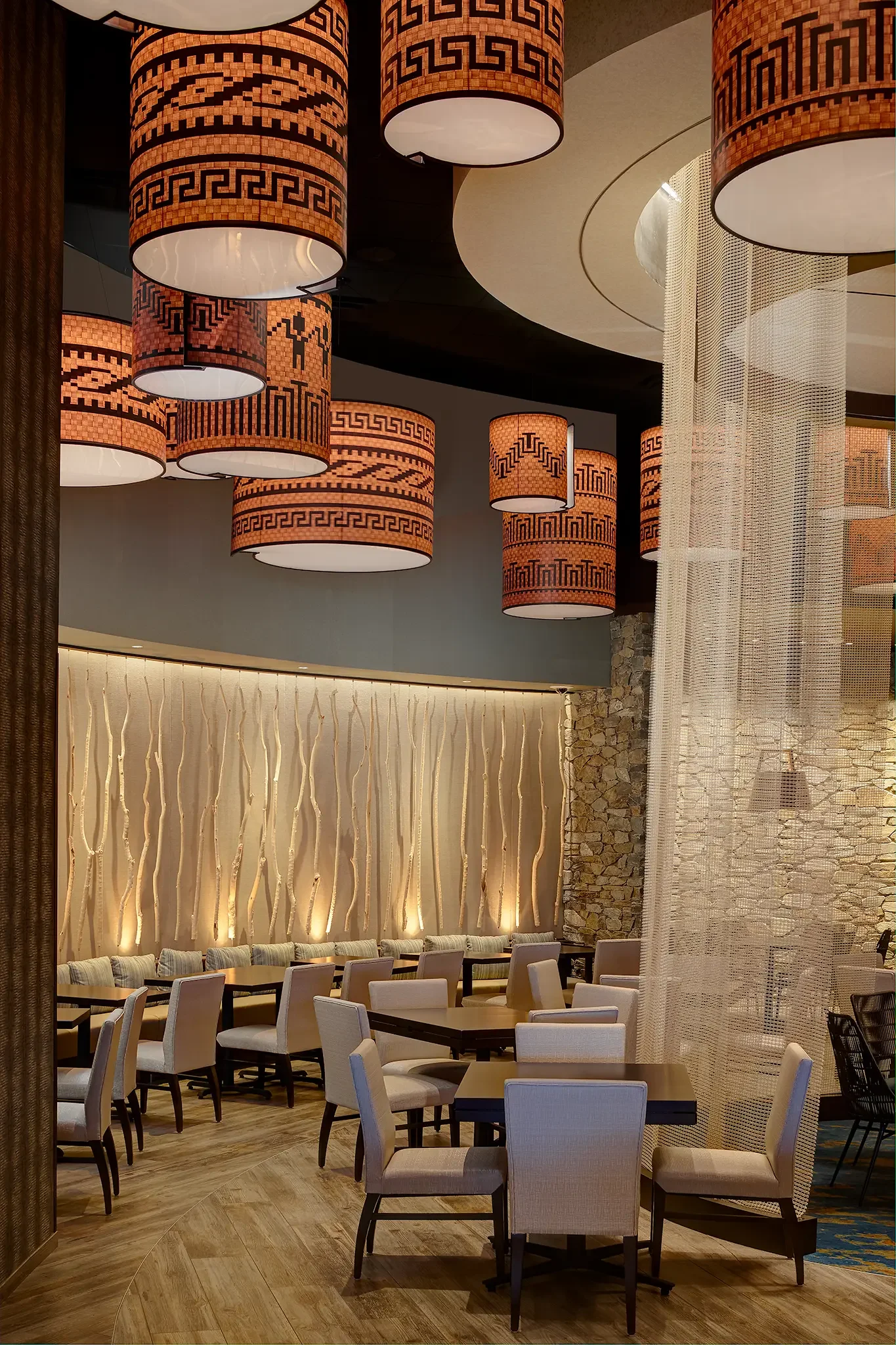 Puyalapabs Café interior design offering a Northwest setting, featuring steaks, seafood, Asian cuisine, and regional favorites inside the Emerald Queen Casino project by Cuningham Architects.