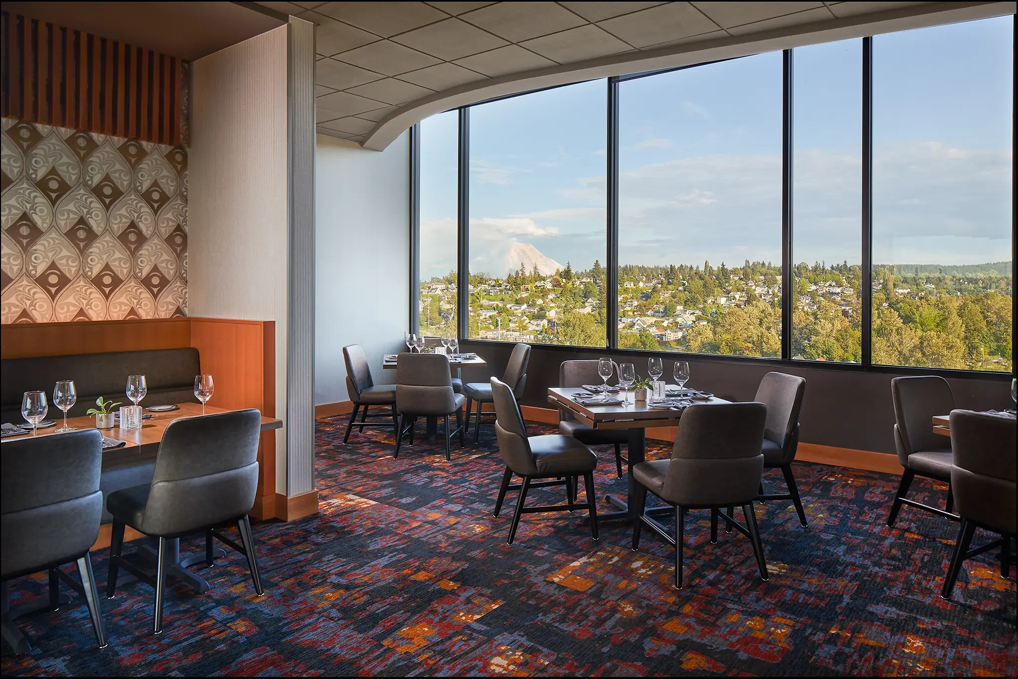 Slahal Steakhouse fine dining interior and restaurant design with panoramic Mt. Rainier views at the Emerald Queen Casino Hotel in Tacoma, WA, by Cuningham Architects.