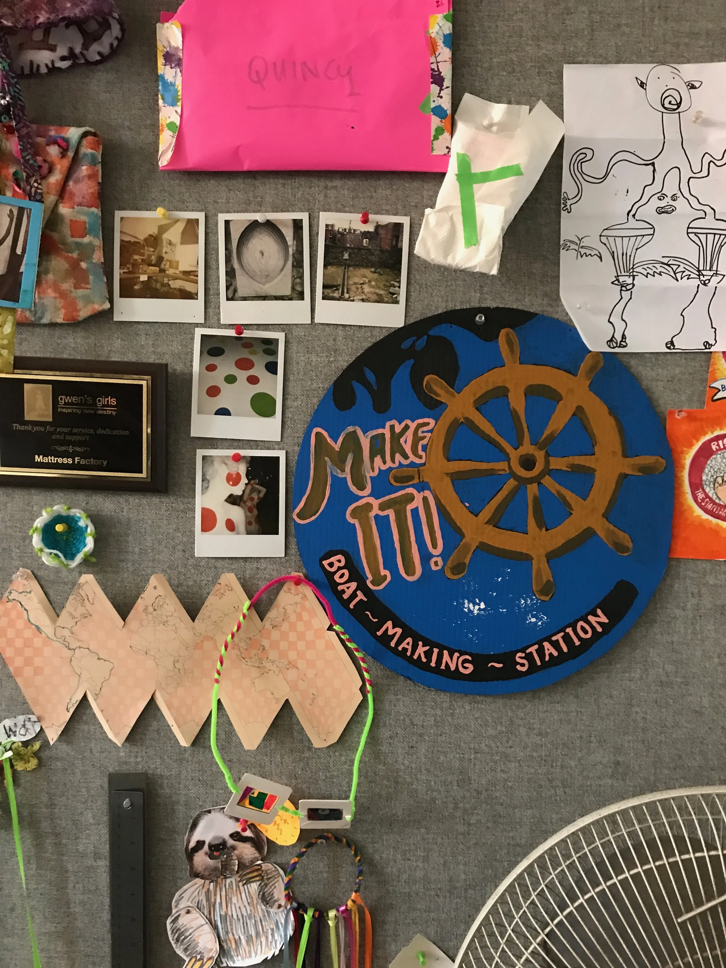 Bulletin board in the studio / a safe space to store Quincy's small pieces