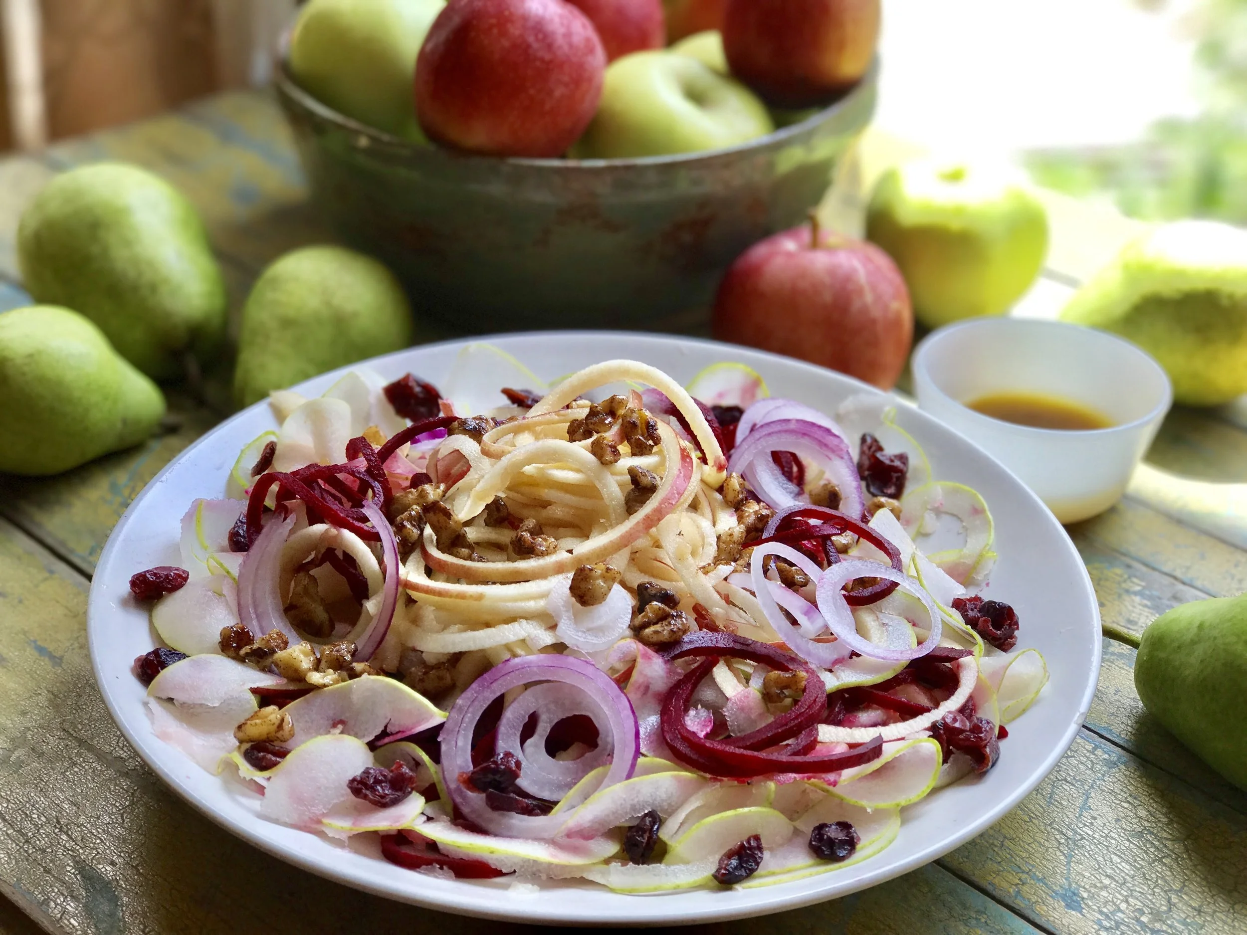      

 
    Spiralized Apple Salad with Maple Glazed Walnuts and Honey Vinaigrette    Late August marks the beginning of apple season. Eating fresh picked seasonal fruits and veggies pack the biggest nutritional bang for your buck. When you eat a fr