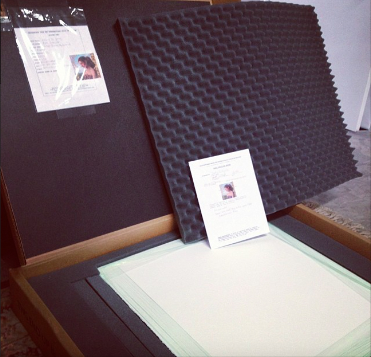 an art shipment box with foam padded interior