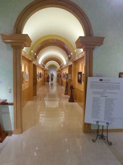museum interior with arched hallway