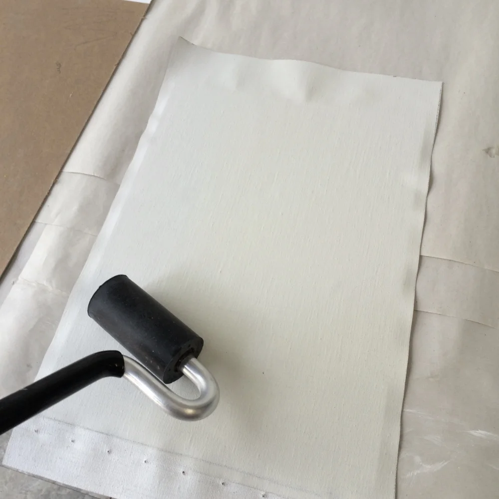 a rubber roller and canvas