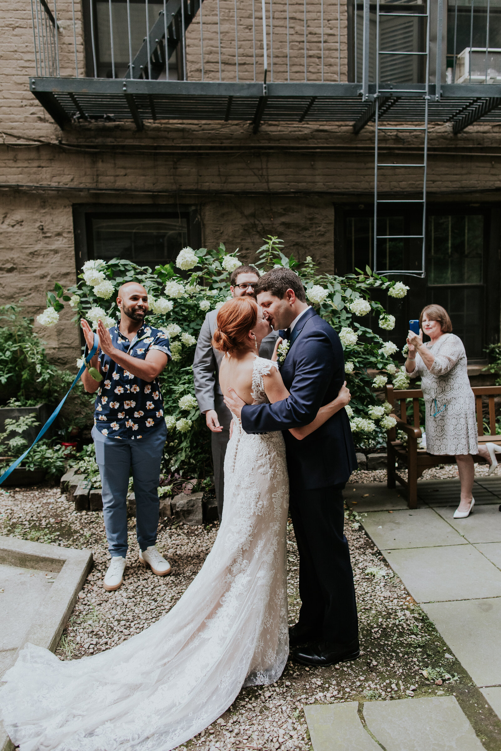 Yes, they actually had a fire escape in the background during their ceremony and I am here for it!
