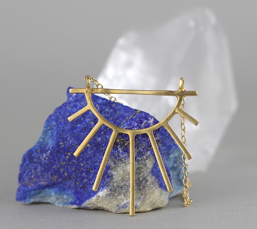 Gold Sunburst necklace - a symbol of vitality