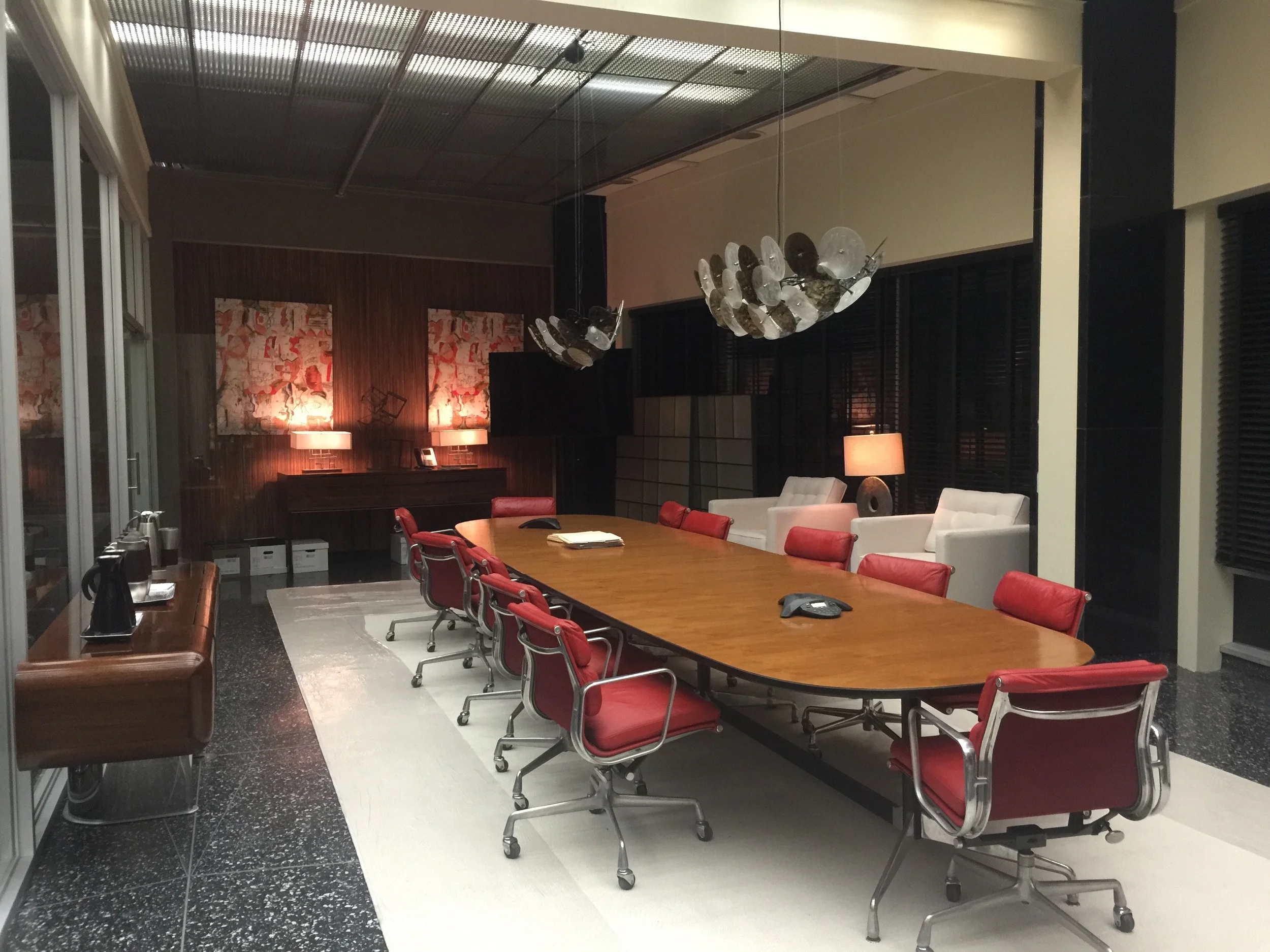 INT. CONFERENCE ROOM - HHV LAW OFFICES