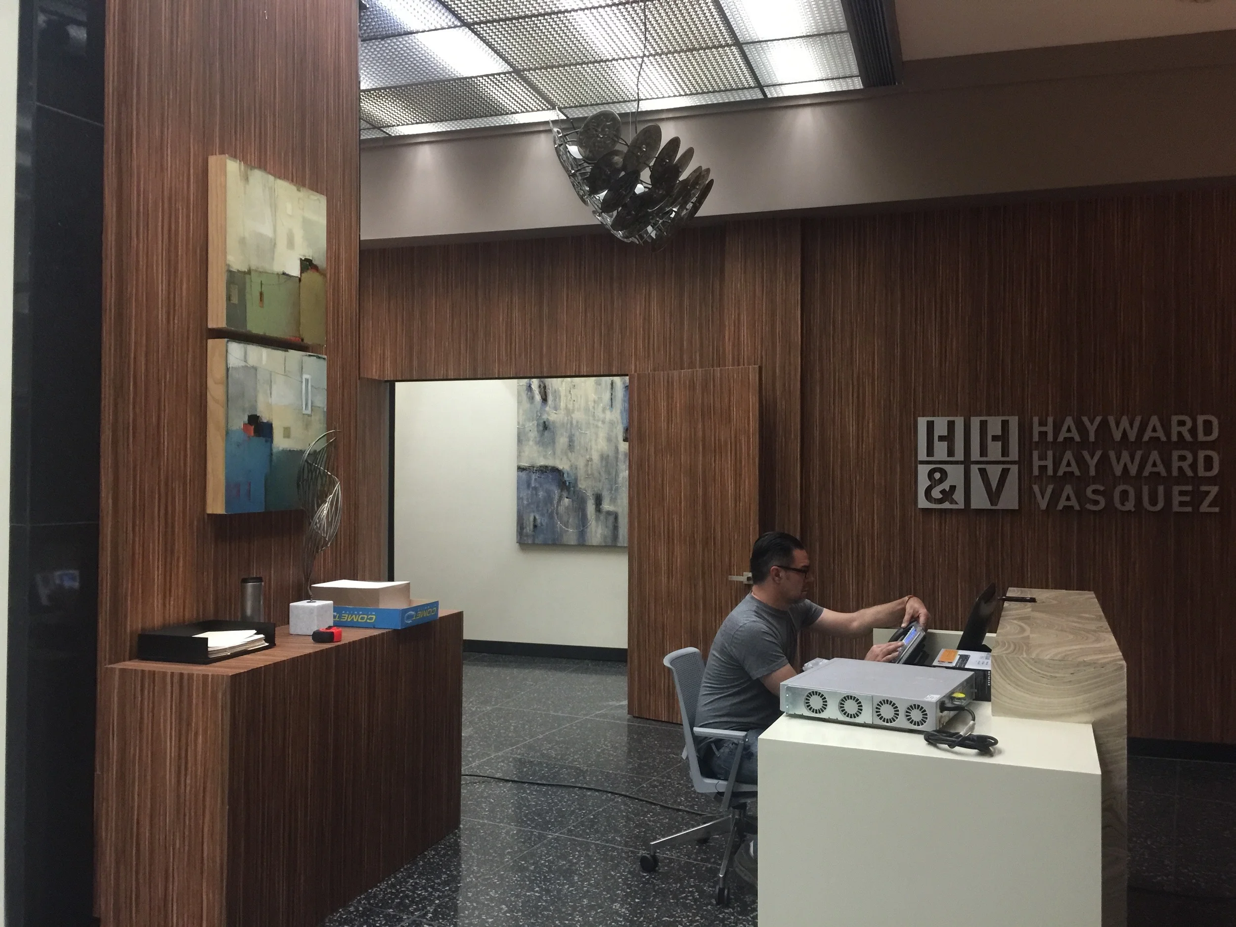 INT. LOBBY - HHV LAW OFFICES