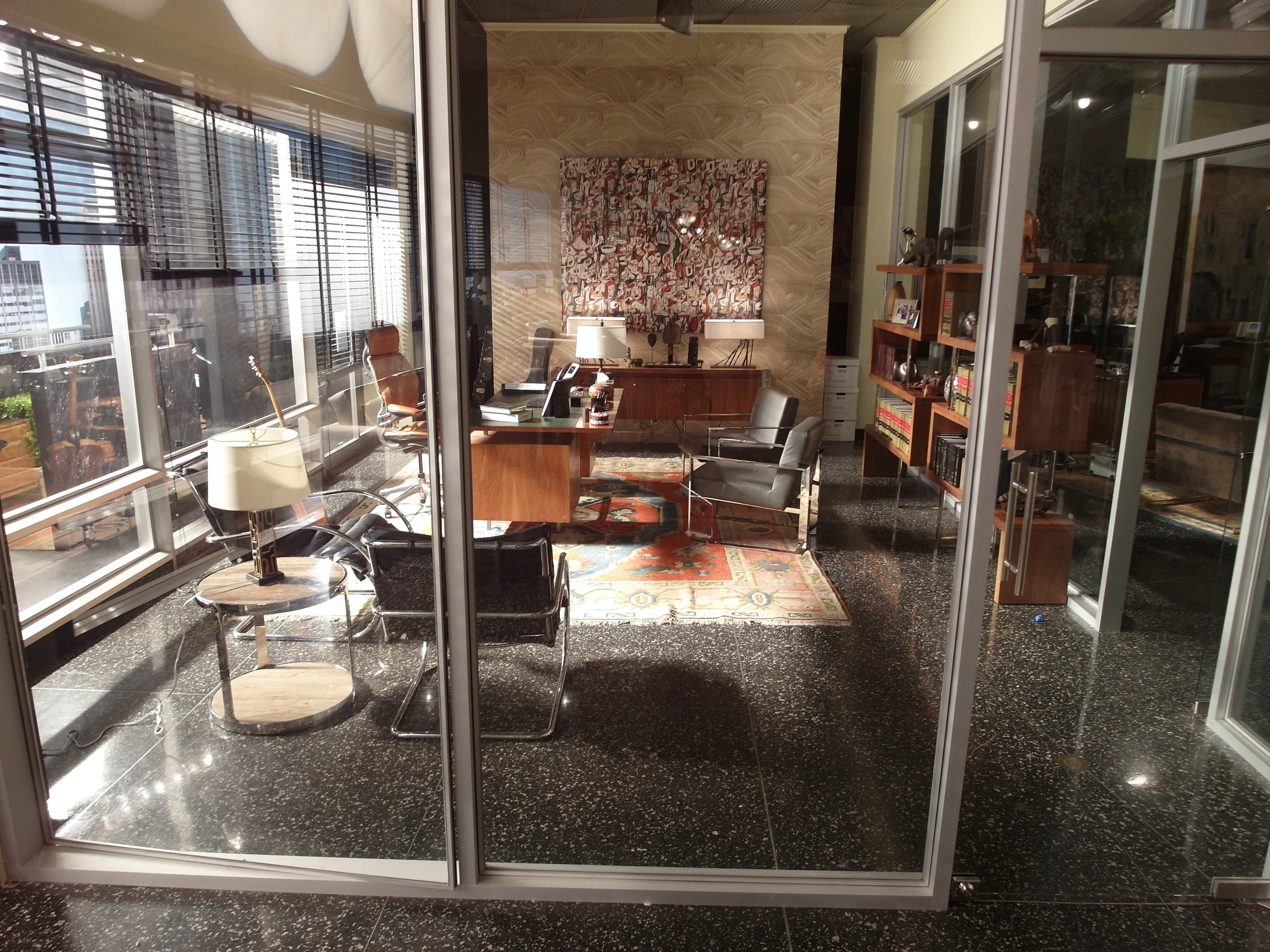 INT. CHARLIE'S OFFICE - HHV LAW OFFICES