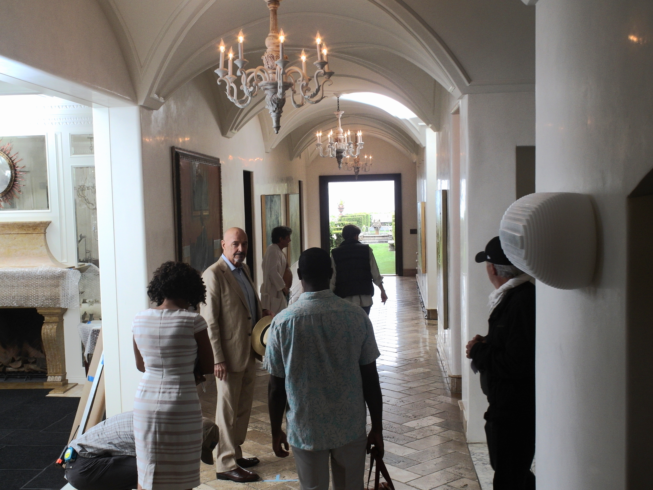 INT. MANSION - HALLWAY