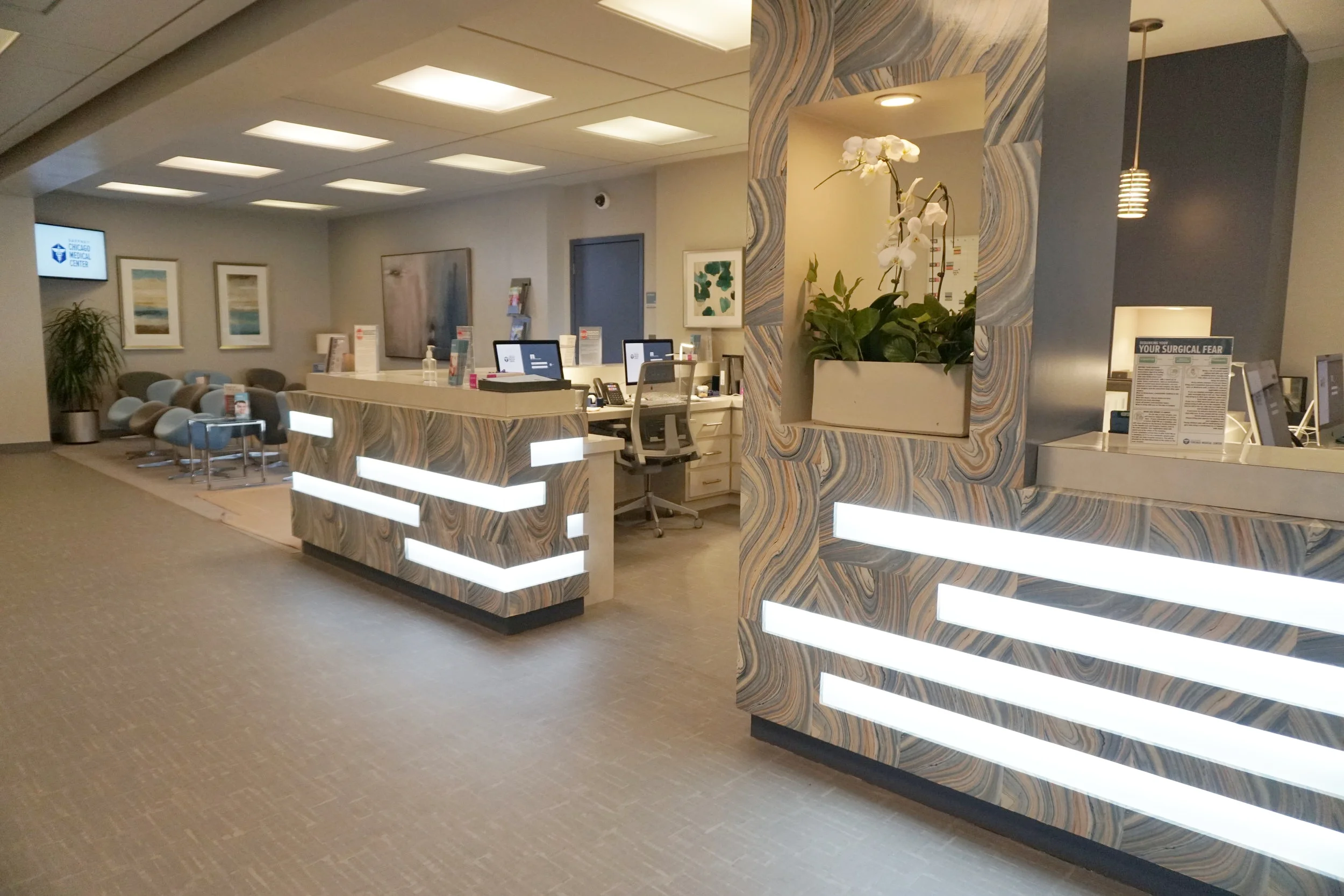 INT. SURGICAL FLOOR - NURSES' STATION