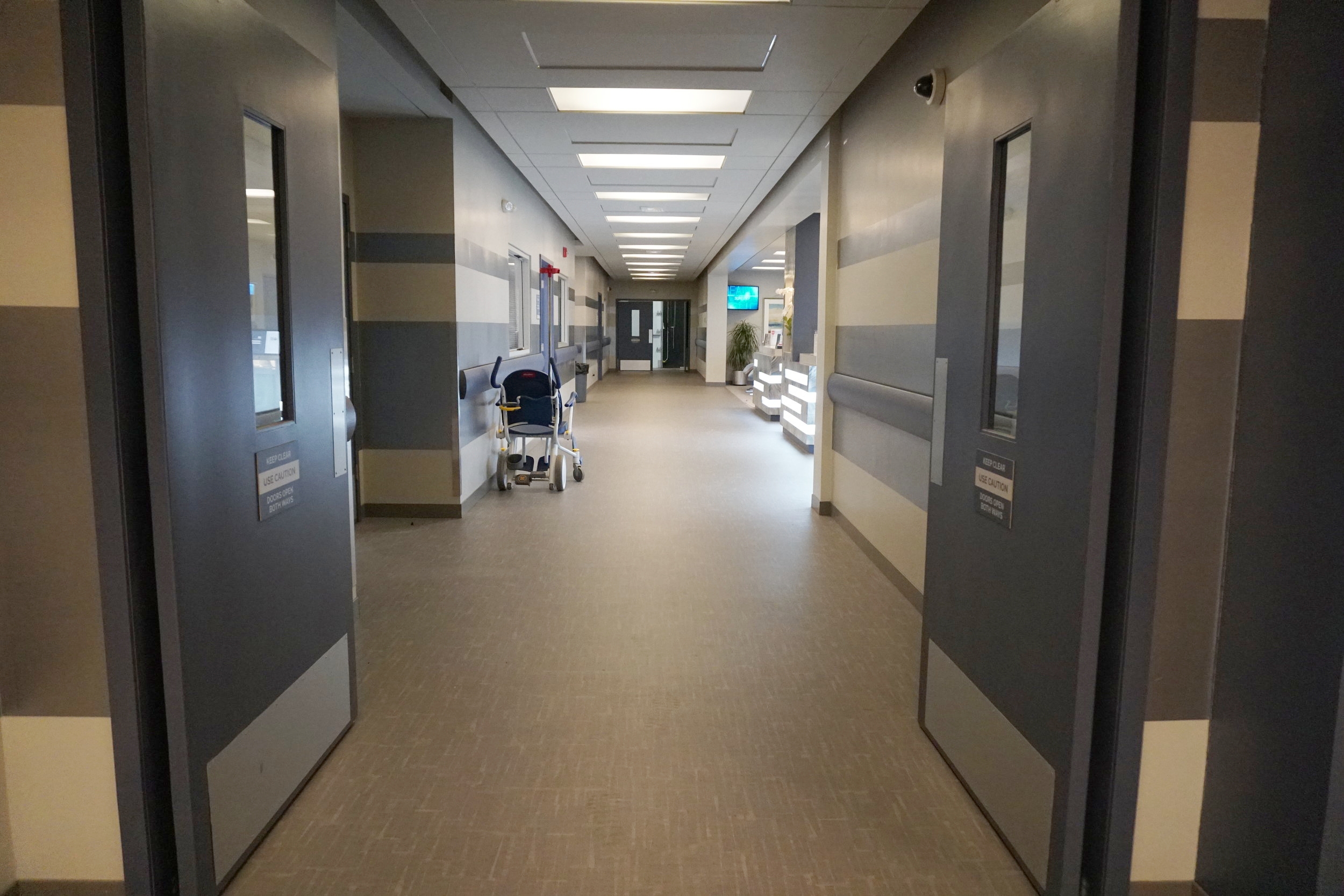 INT. SURGICAL HALLWAY