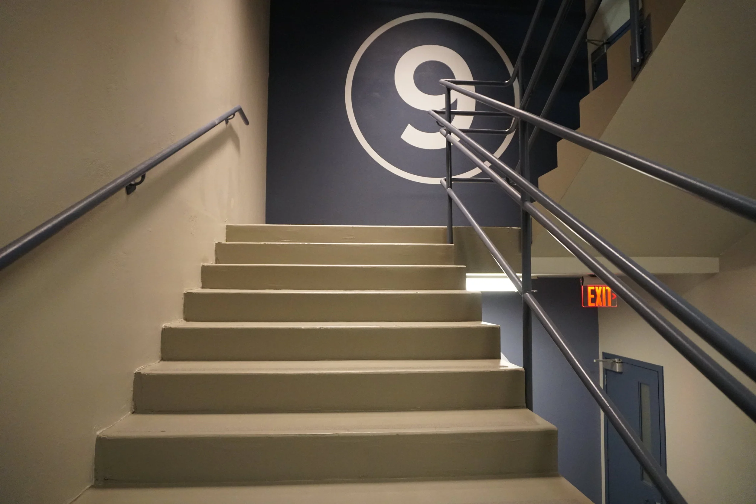 INT. HOSPITAL STAIRWELL