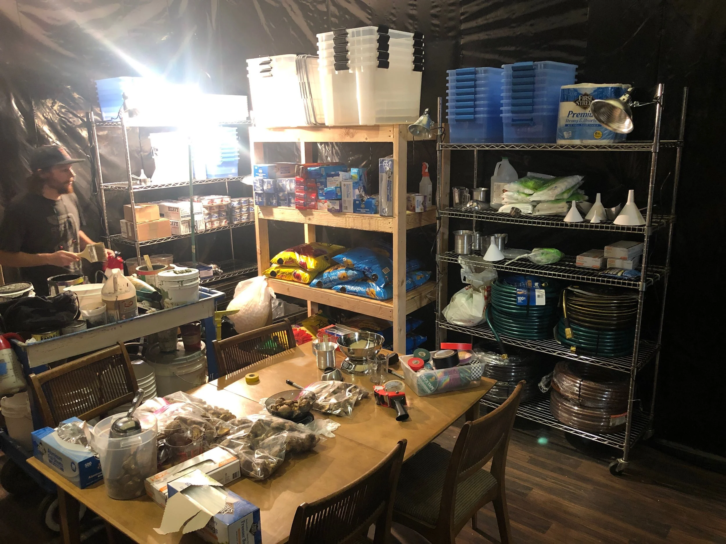  INT. MUSHROOM GROW HOUSE 