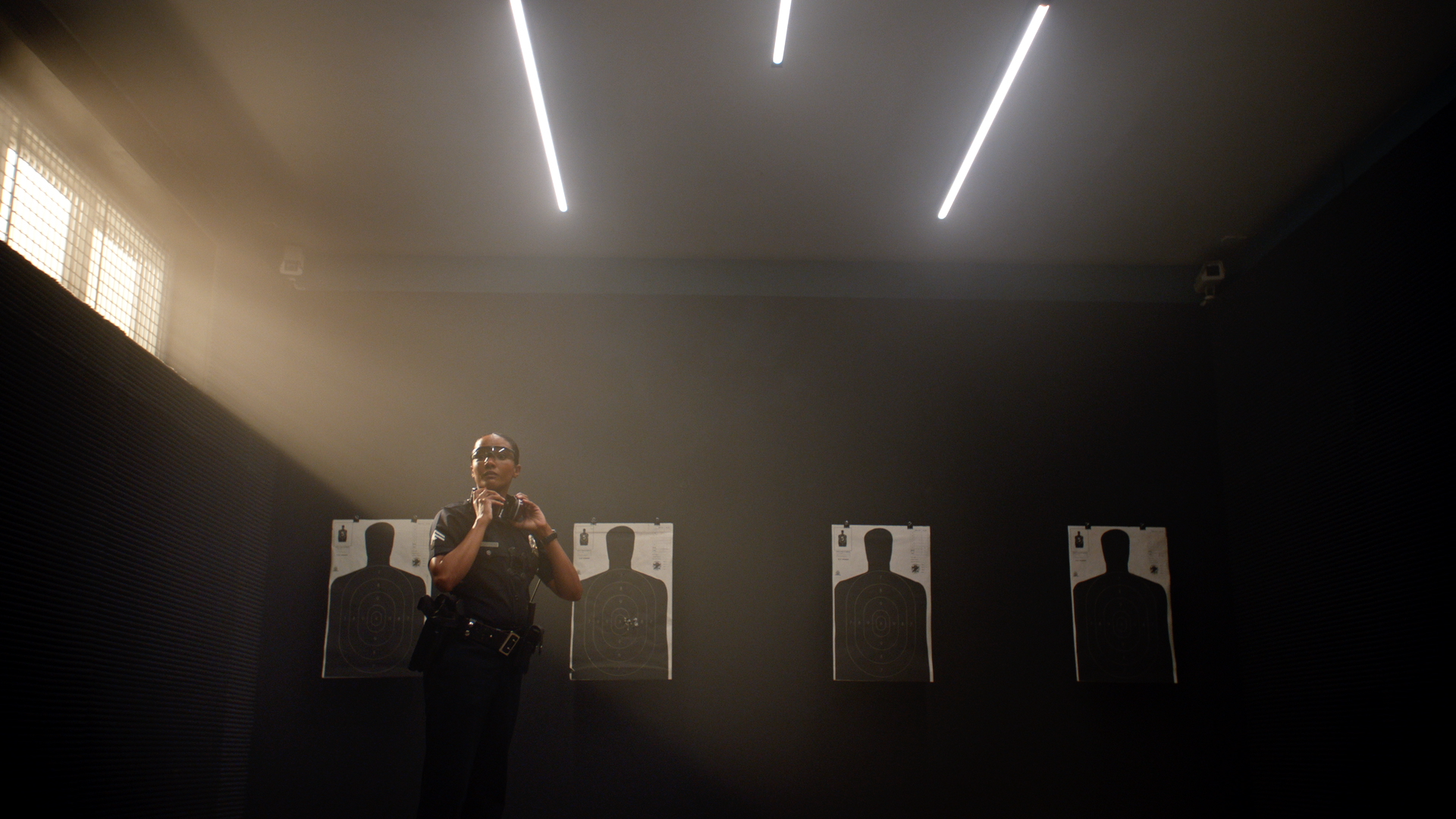 INT. SHOOTING RANGE - STAGE BUILD