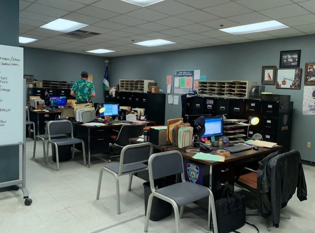 INT. COP STATION - JOE'S WORK (blue)