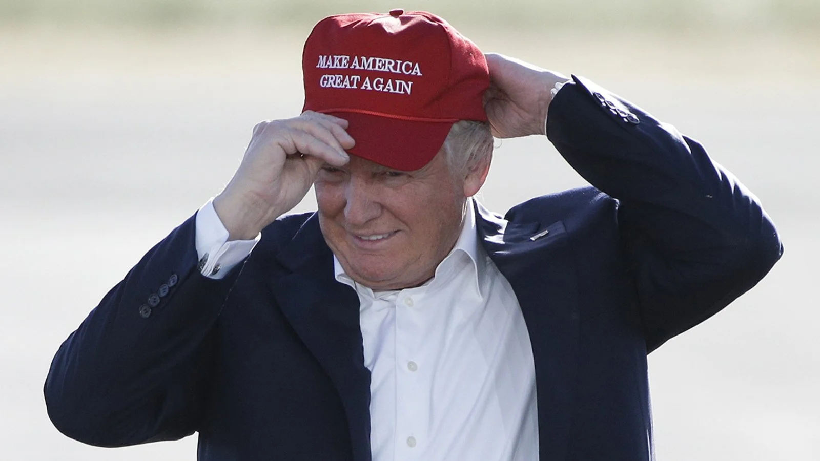 3201772_031118-cc-ap-trump-maga-hat-img.jpg