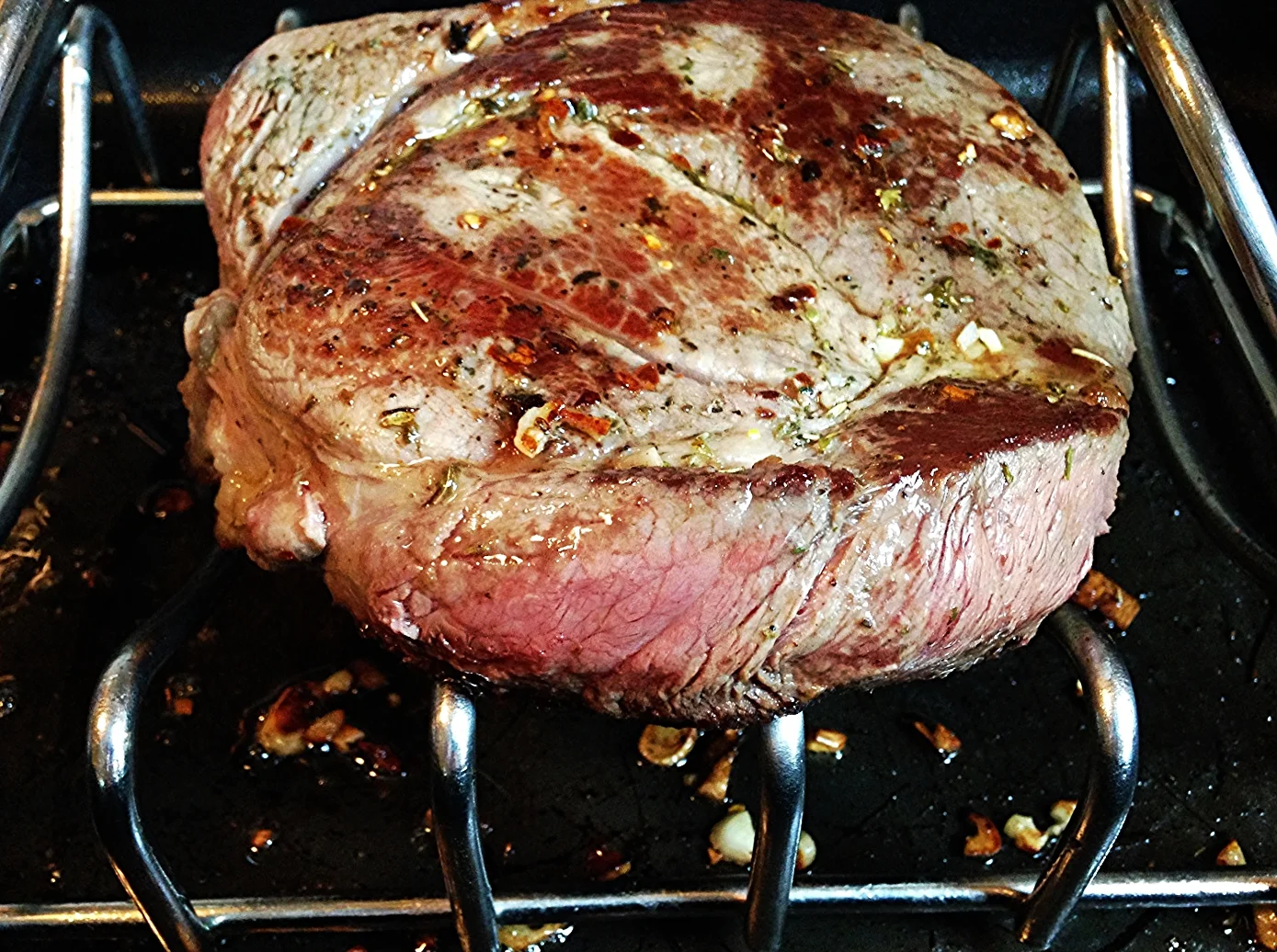 Grass Fed Sirloin Tip Roast with Baked Potatoes, and Sautéed Swiss