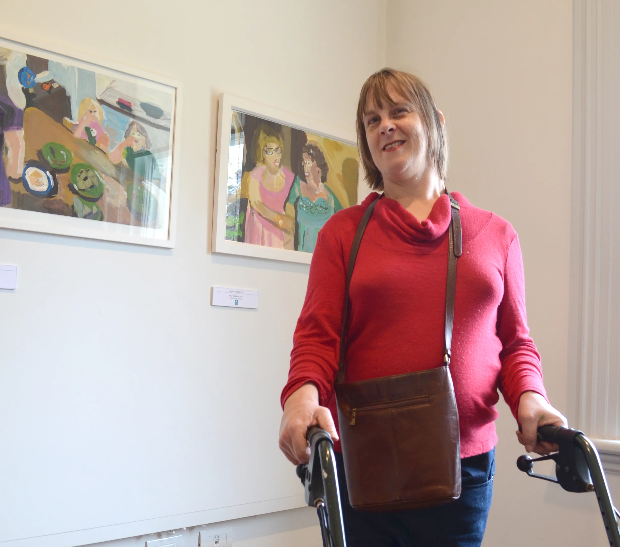 Allyson in front of her work in the Visual Perceptions exhibition at The Pah Homestead