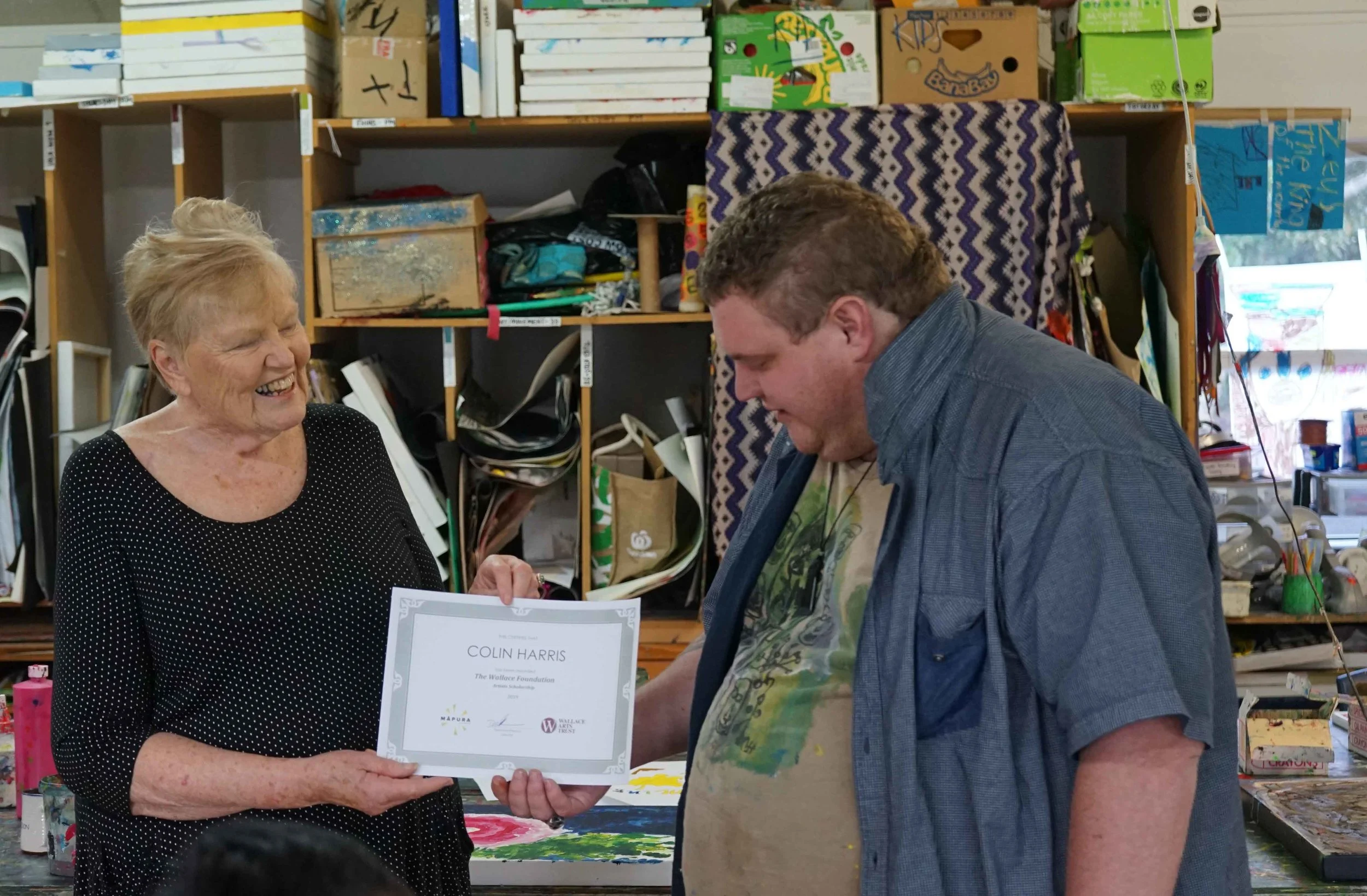 Director Diana McPherson presenting Colin Harris the Wallace Trust Scholarship 2019 at Māpura Studios