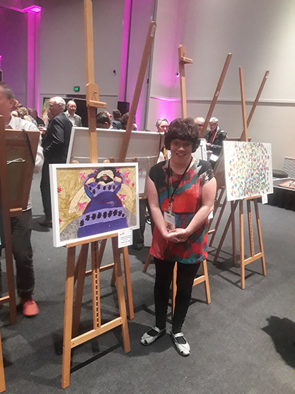 Sian Thomas and her painting