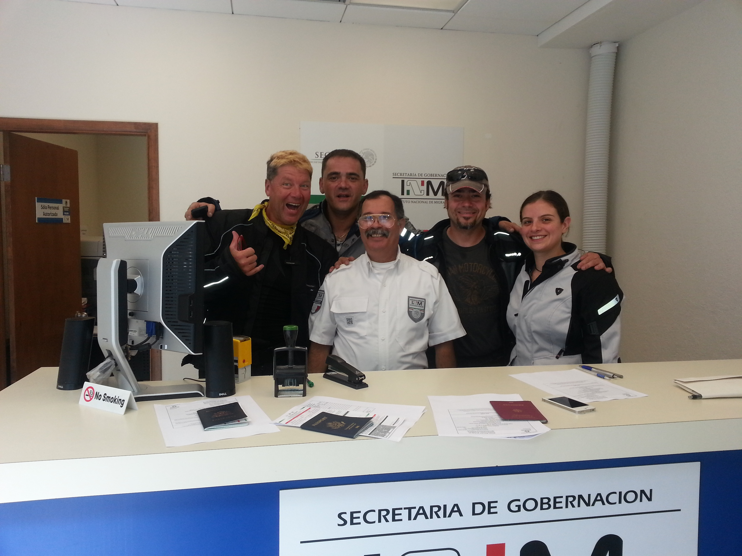 Posing with the immigration officer Alberto Castro
