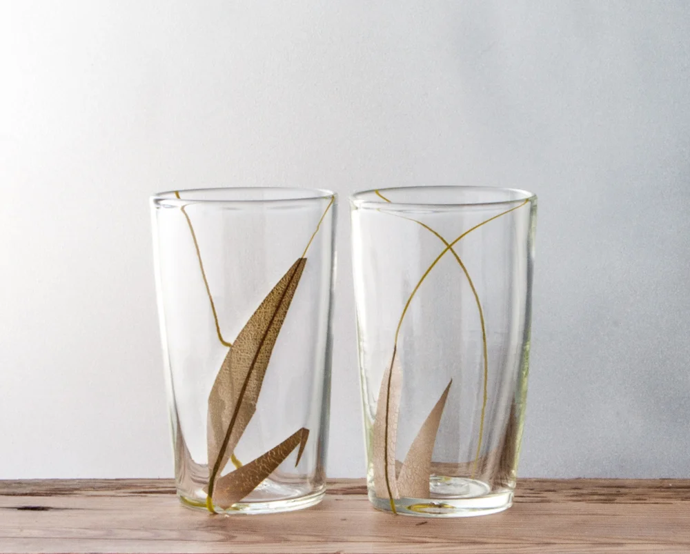 GRASS/ the grass series pays homage to that lowly plant beneath our feet that so much of civilization is built upon using hand cut silver foil each piece is unique SHOP CUPS