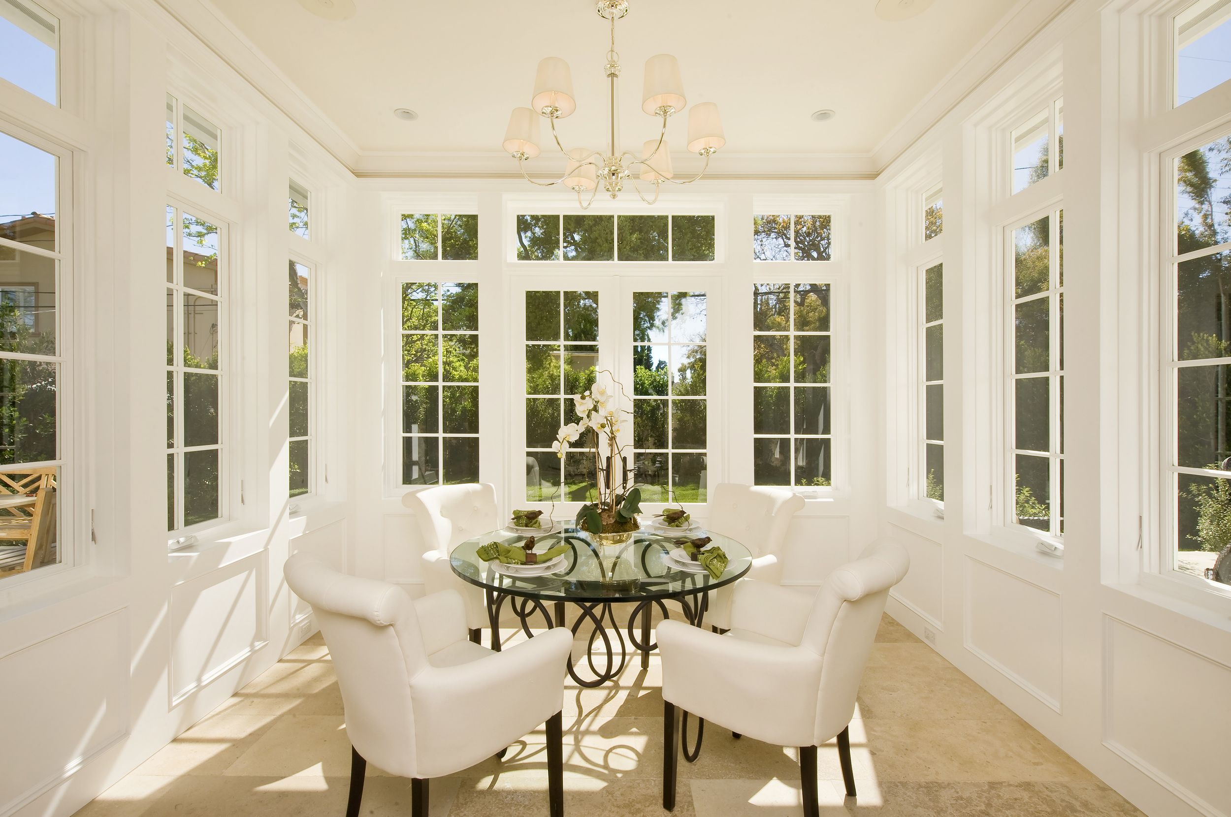 Empire Group. Breakfast room in an all glass conservatory. I used this concept in London many times to great effect.