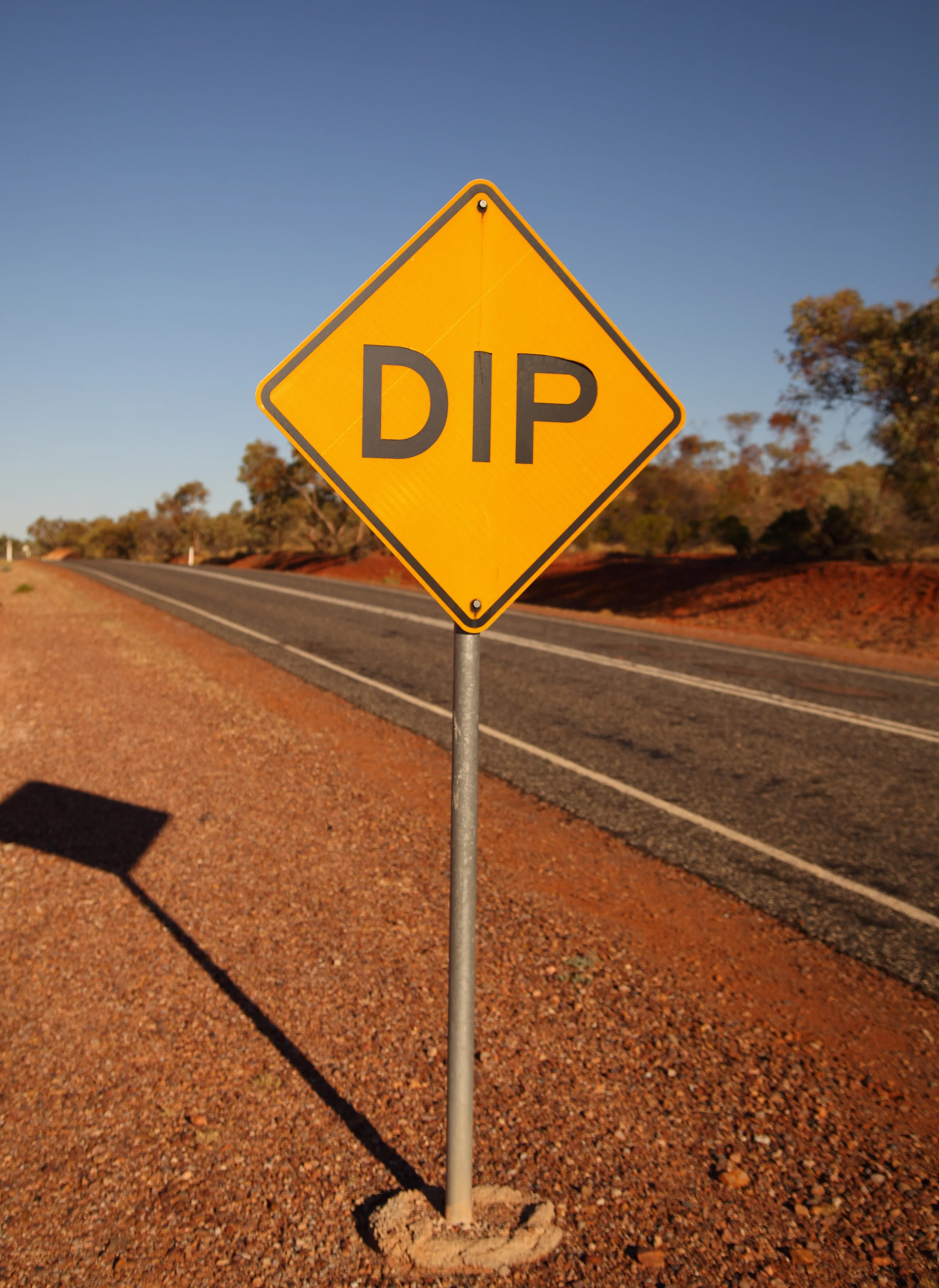 The stark honesty of outback road signage.