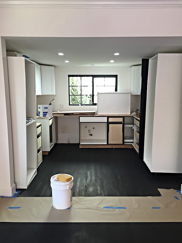 My beautiful black floors after the first coat of stain.