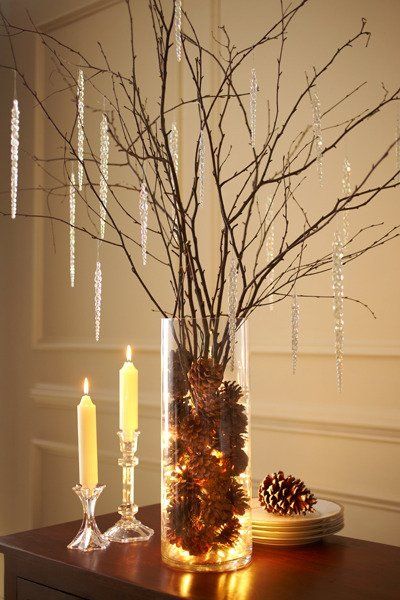 DIY that's actually doable. Lights, pine cones, branches, and you're done. Apartment Therapy