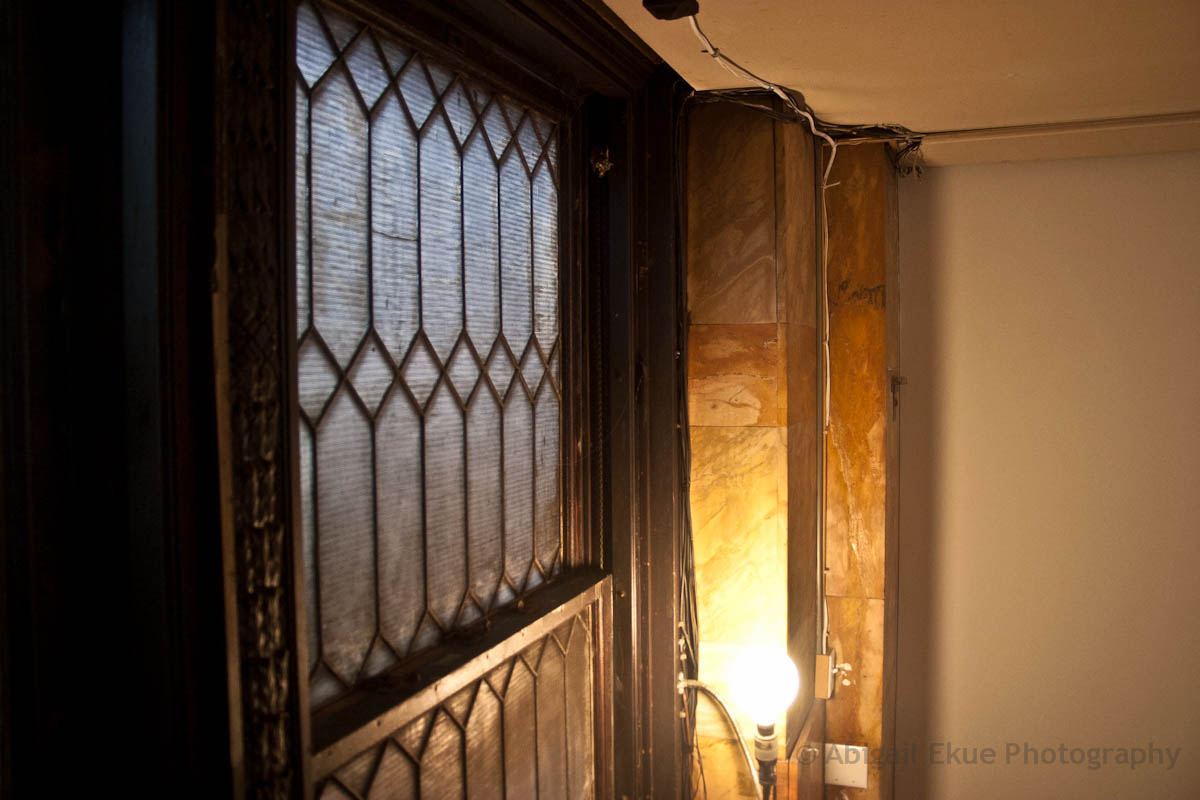 Windows in the staircase to the second level of 190 Bowery