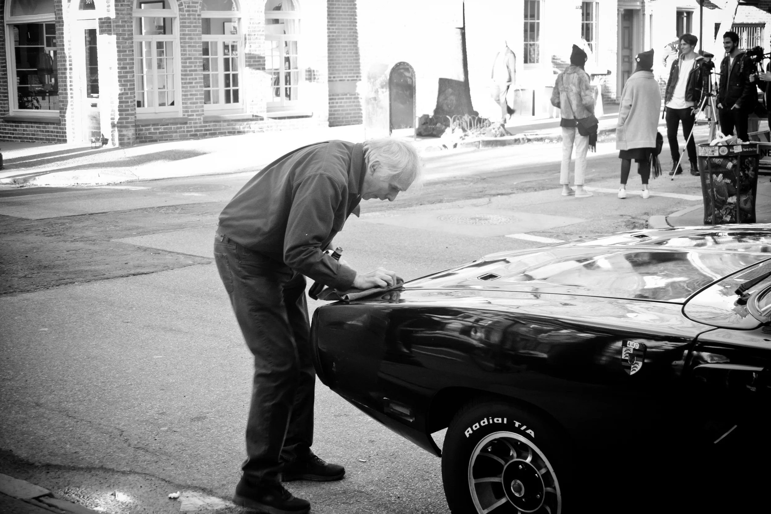 One of New York City's car lovers I met on a recent weekend photo walk. This man told us he bought the Charger from his deceased buddy's widow. He admitted to being a perfectionist and loving the car in black.