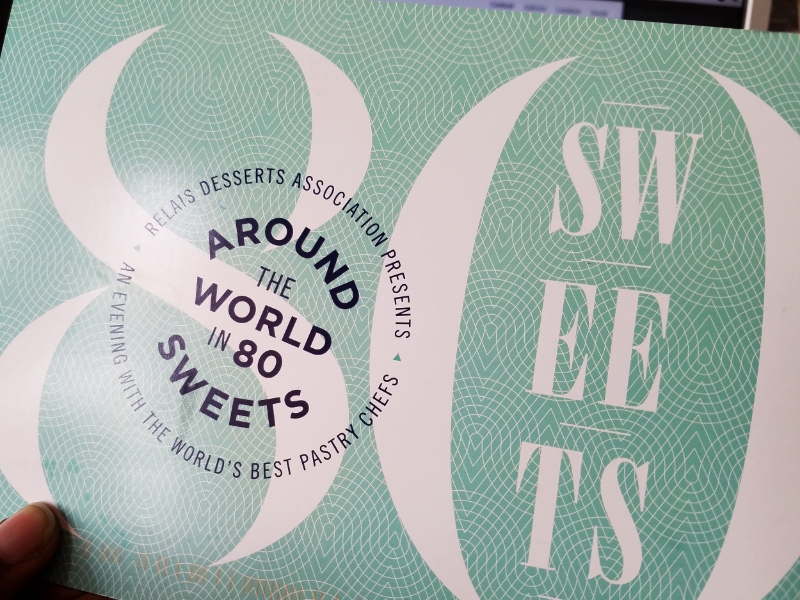 The invitation to Around the World in 80 Sweets I received in the mail.