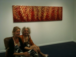 Maggie and Sar in front of Fire, Red, Copper & Gold .jpg