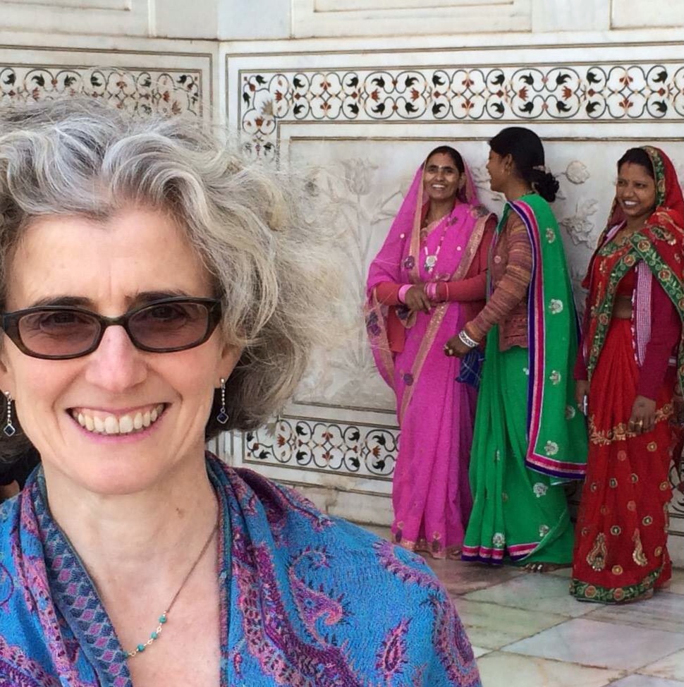 One of our customers wearing her Seven Sages necklace on a recent trip to India!