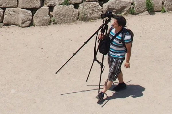 Visual designer Marcos Nolan inspects ruins in Turkey.