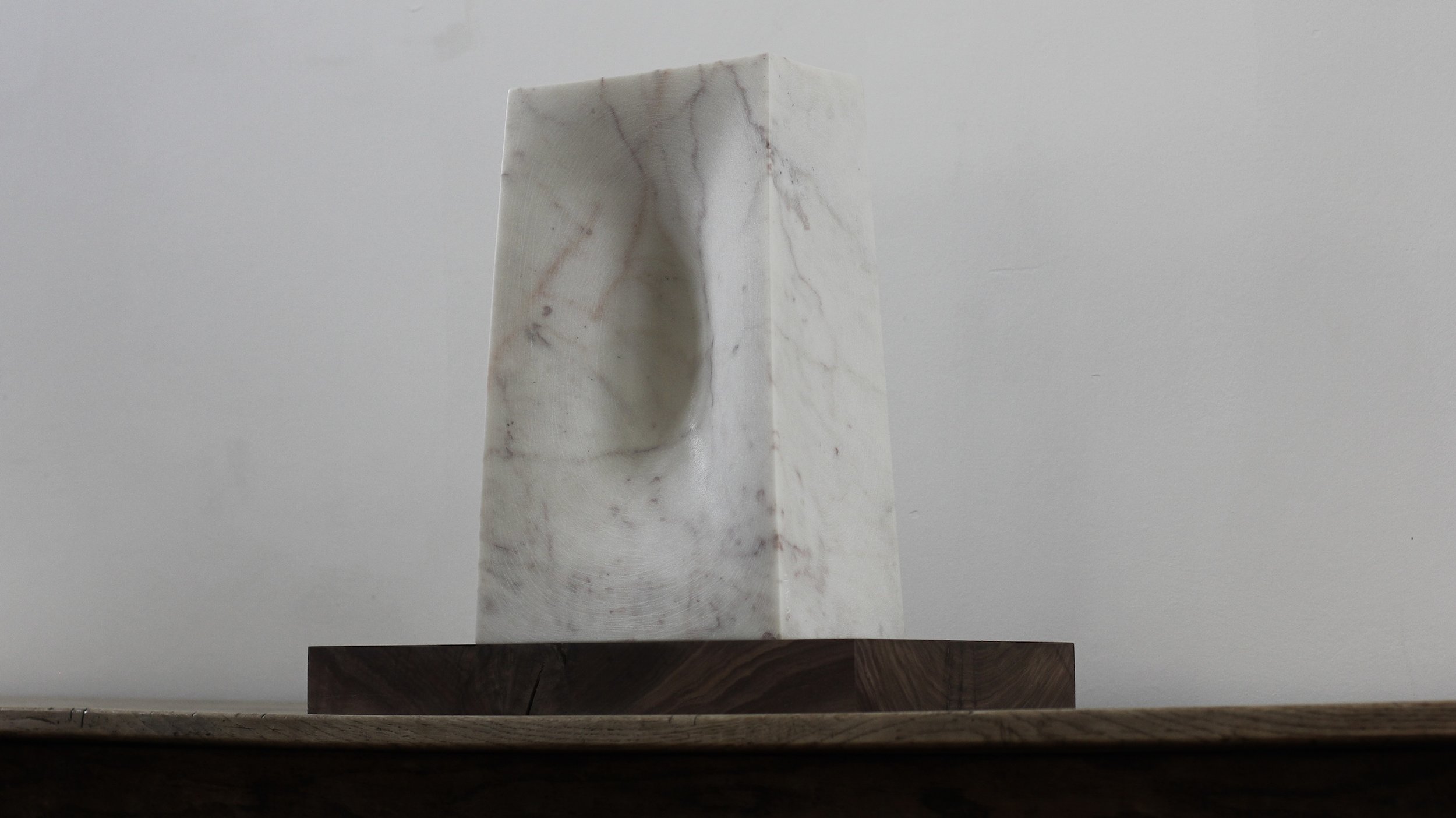 The Hint, Marble on chestnut base.
