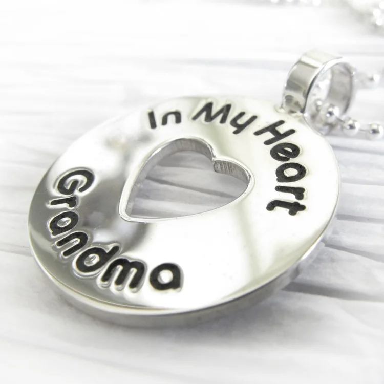Sterling silver memorial necklace with heart and engraved name (3).jpg