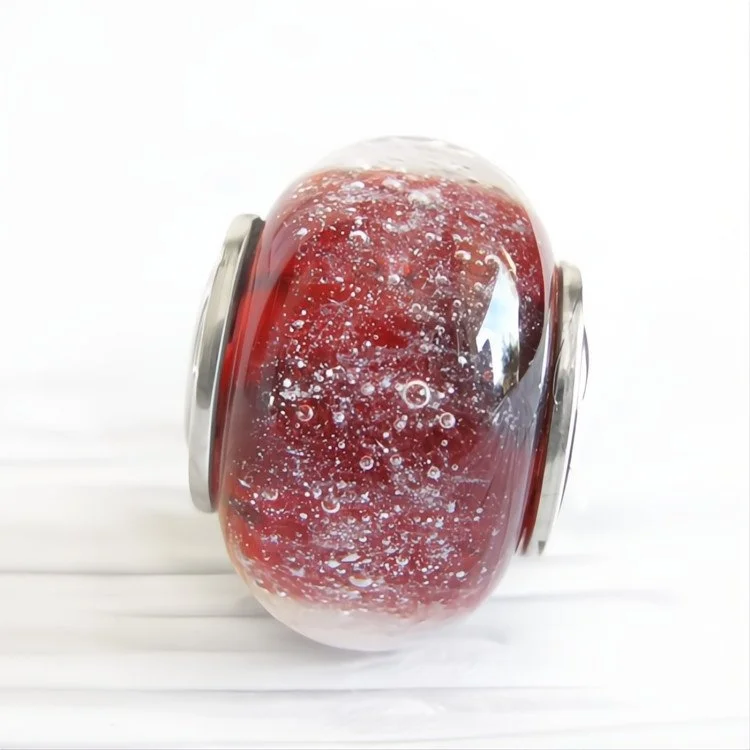 Glass cremation ash infused pandora bead with sterling silver Locked in Art 2.jpg